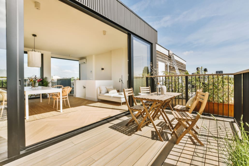 Bright balcony with chair and door